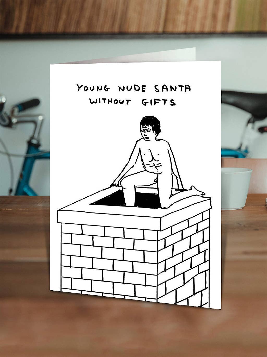 David Shrigley Lustige Weihnachtskarte — junger nackter Weihnachtsmann