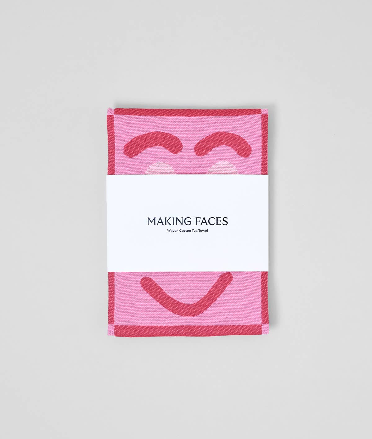 Making Faces Pink/Maroon Woven Cotton Tea Towel