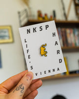 Take No Shit Pin von NKSP – Pin auf Steckkarte mit Schriftzug NKSP Life's hard Vienna